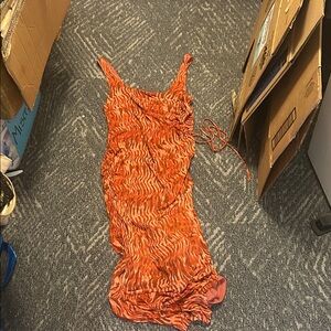 House of Harlow 1960 Orange Patterned Maxi Dress. Cutout on side. Lined.